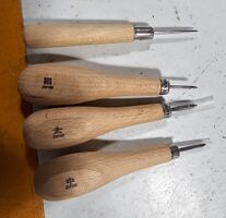 Top: scratch awl. Bottom 3: various sizes of saddler's awl.