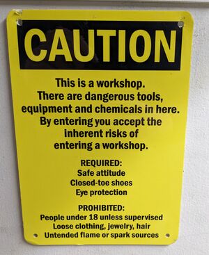 Machining Yellow Door Sign.jpg