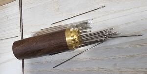 These are John James Saddler's Harness needles in size 004 (the smallest and most versatile John James makes).